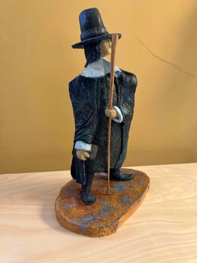 Ceramic sculpture of a Pilgrim Father preacher