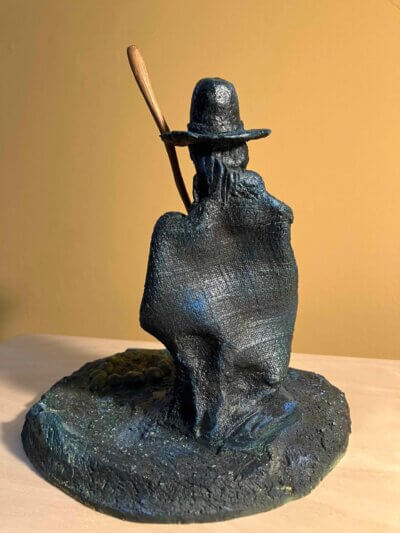 Ceramic sculpture of a Pilgrim Father preacher