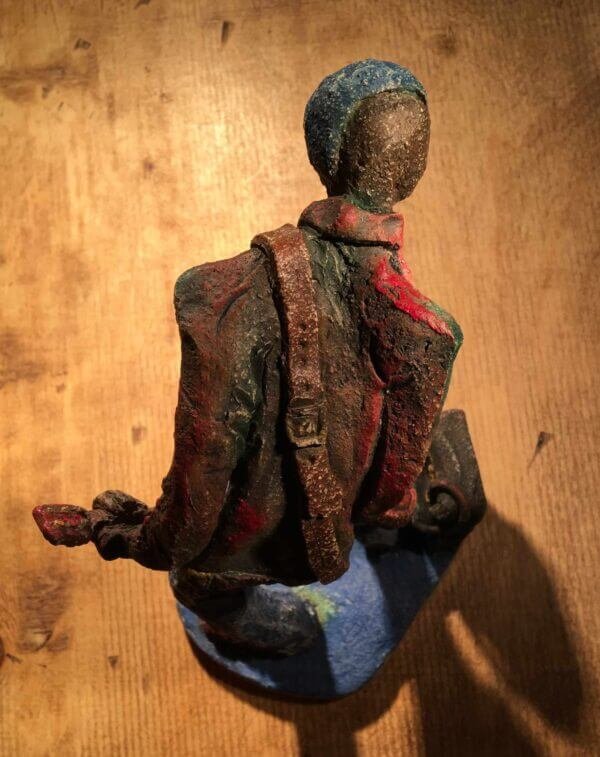Ceramic sculpture of a punk guitarist