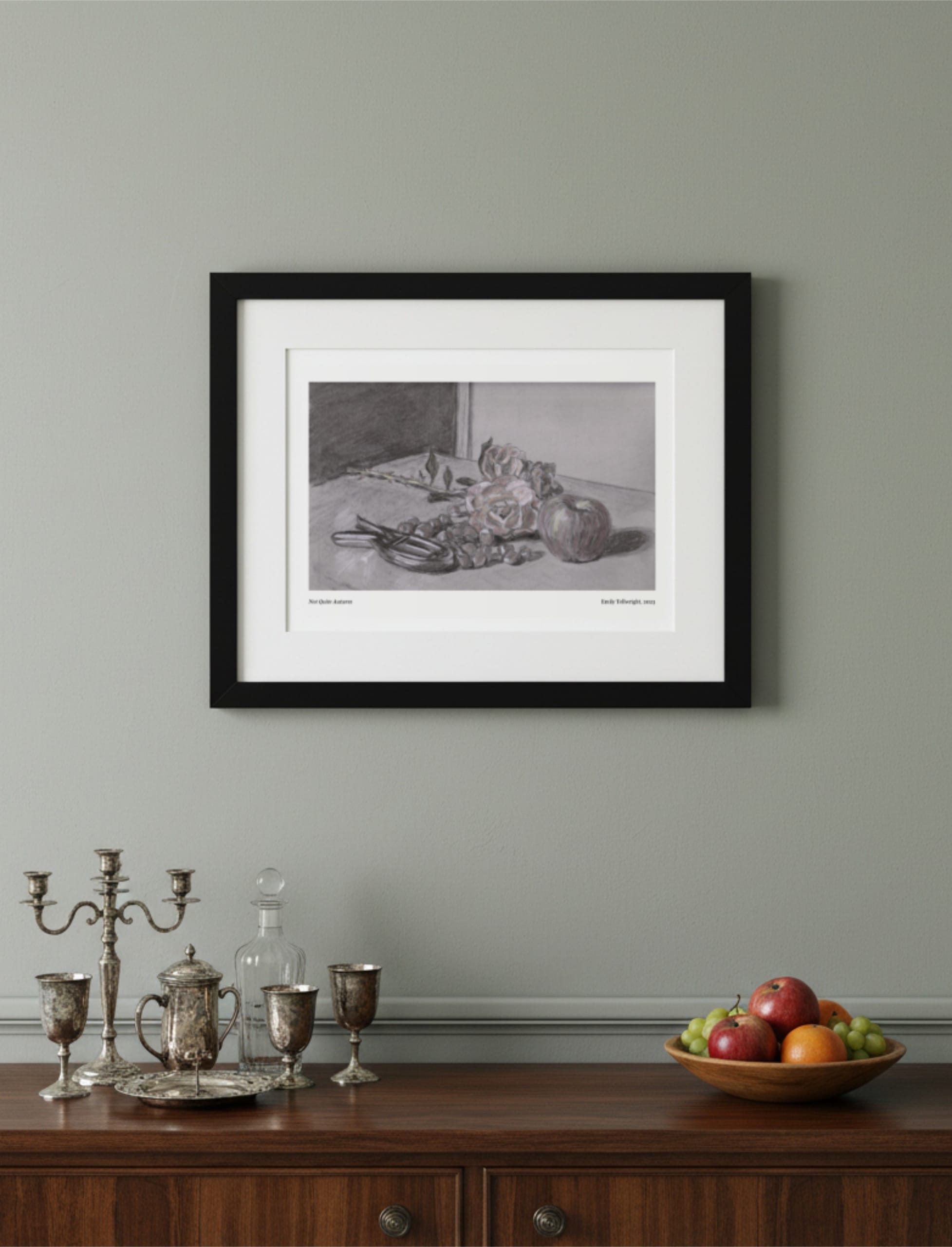 Not Quite Autumn Framed Art Print above a sideboard with silverware and fruit