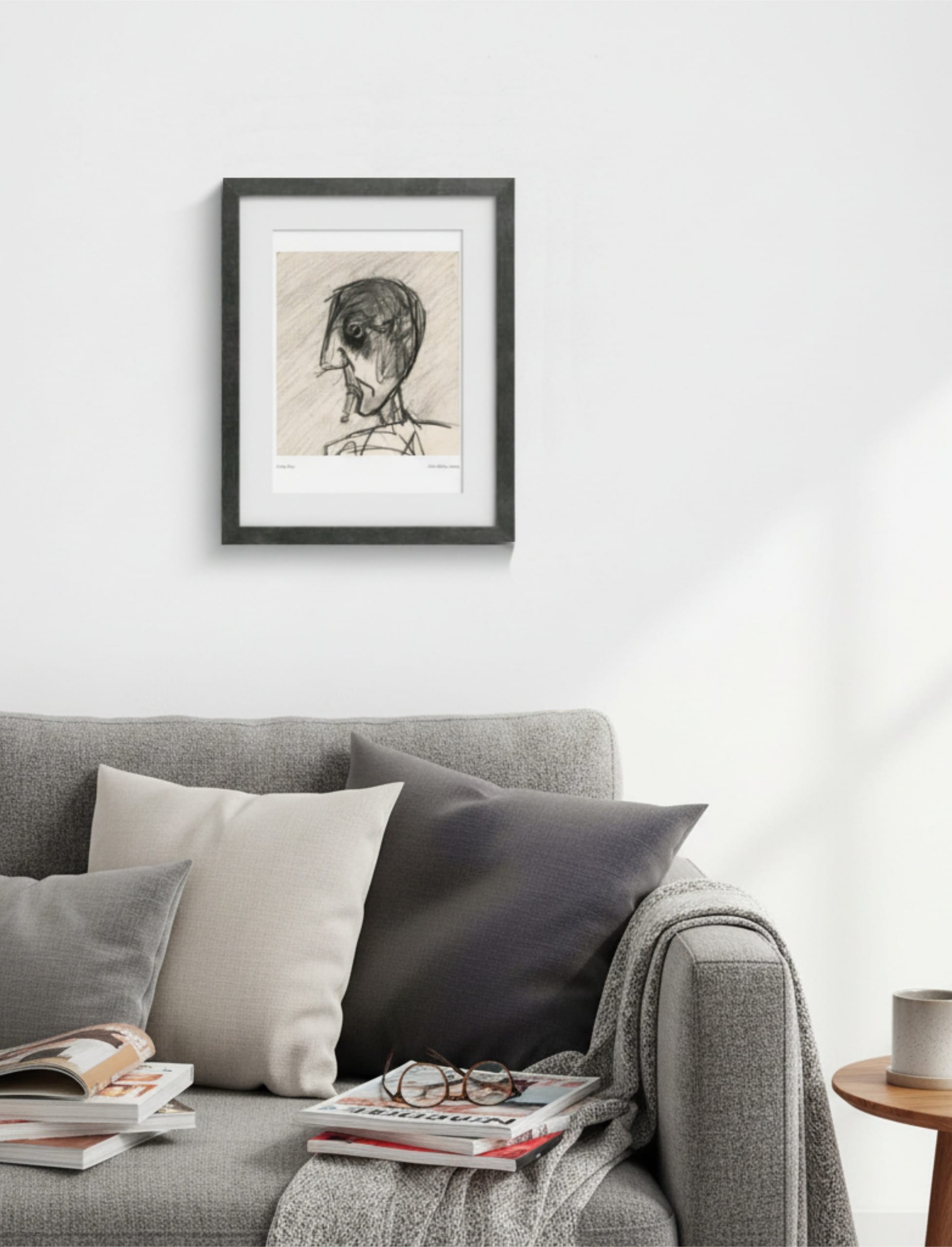 Grey Day Framed Art Print above a grey sofa