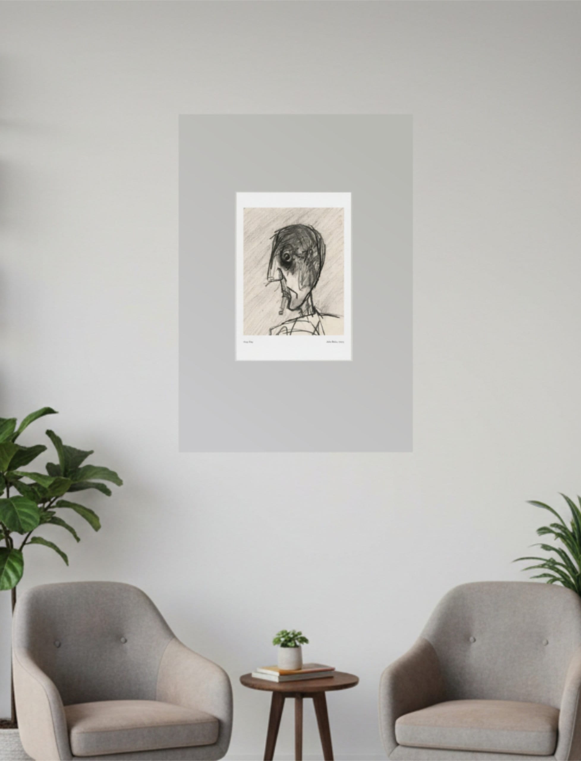 Grey Day Art Print A4 above two chairs and a table with book shelves and plants either side