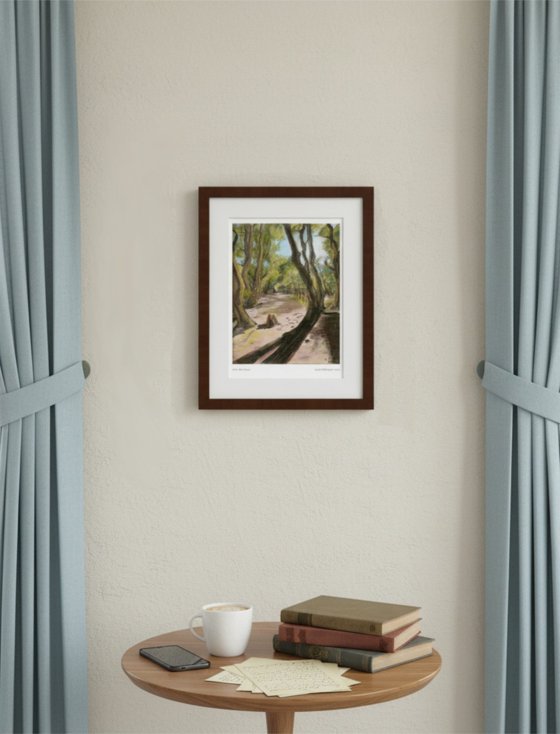 Path After Lines framed Art Print on a cream wall with blue curtains and a side table with cup and books