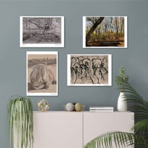 Four art prints arranged on a wall