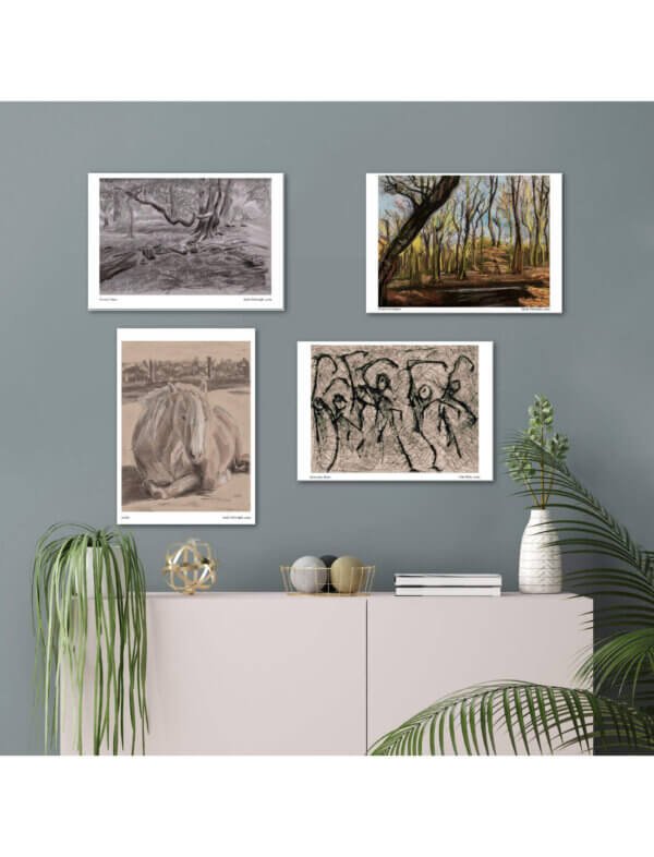 Four art prints arranged on a wall