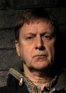 Portrait photograph of John Blake, author and artist.
