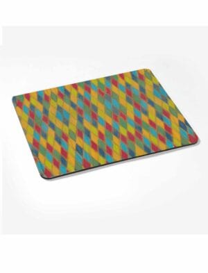 Harlequin placemat - a wood and cork table mat with an original desig by Emily Tellwright