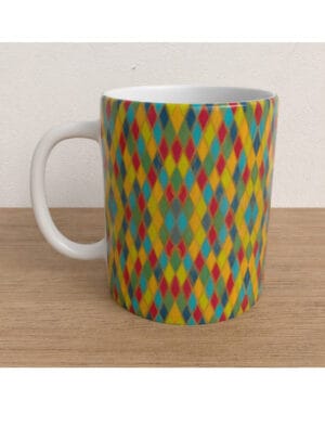 Harlequin Mug featuring a handpainted design by Emily Tellwright