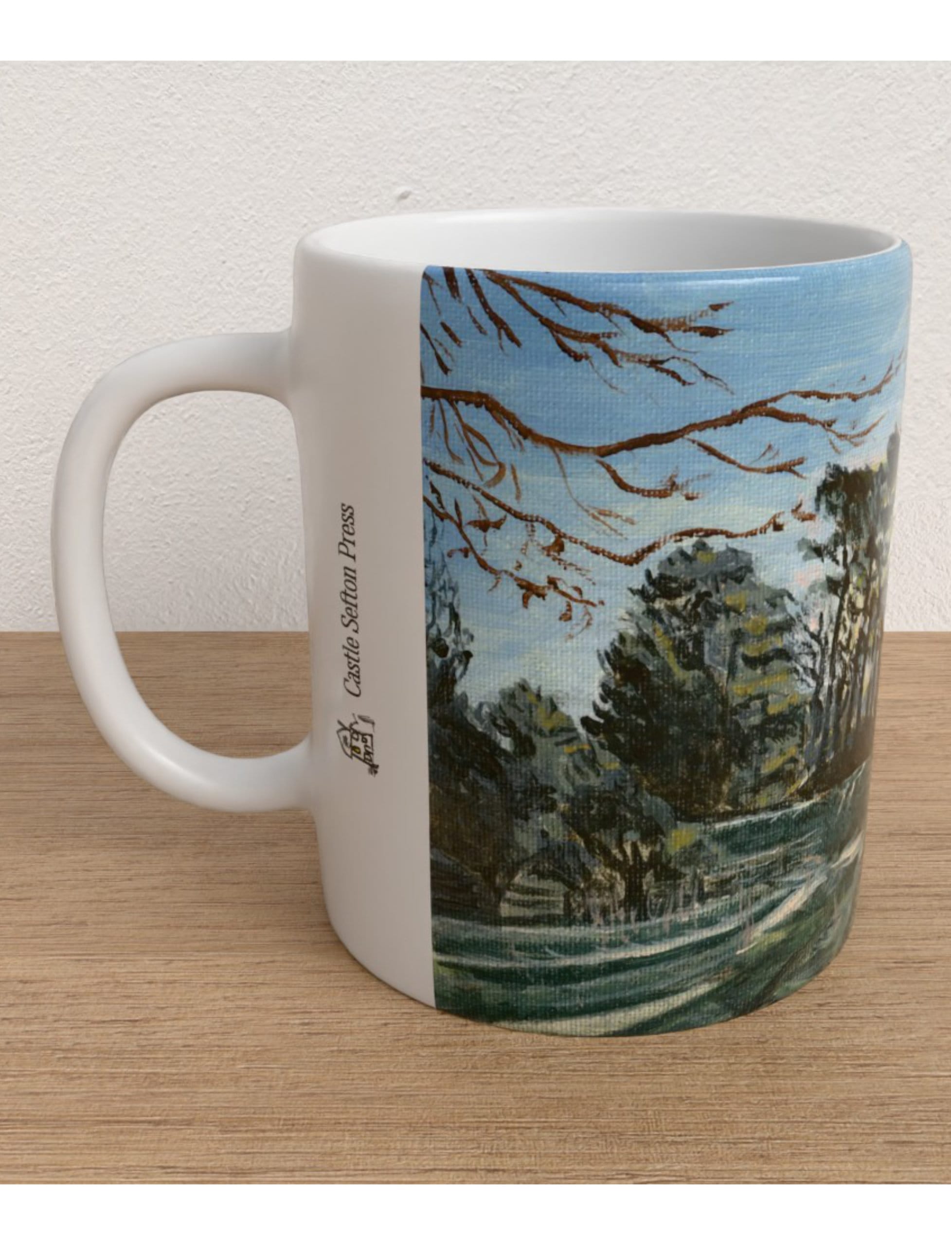 Winter Sun Through trees mug showing an acrylitc painting of winter woodland