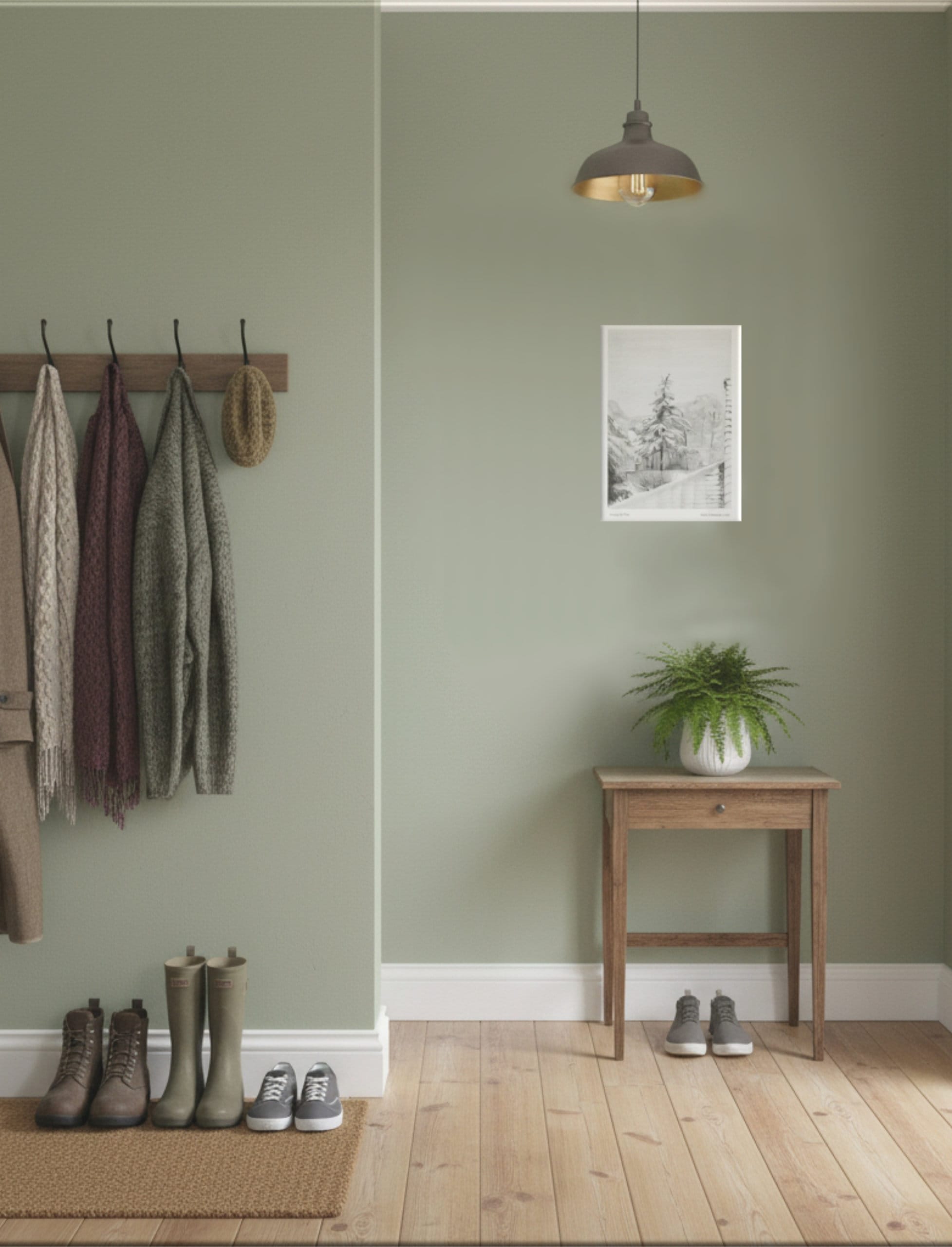 Snowy Fir Tree Art Print A4 on a green wall above a side table in a hall with shoe and coats