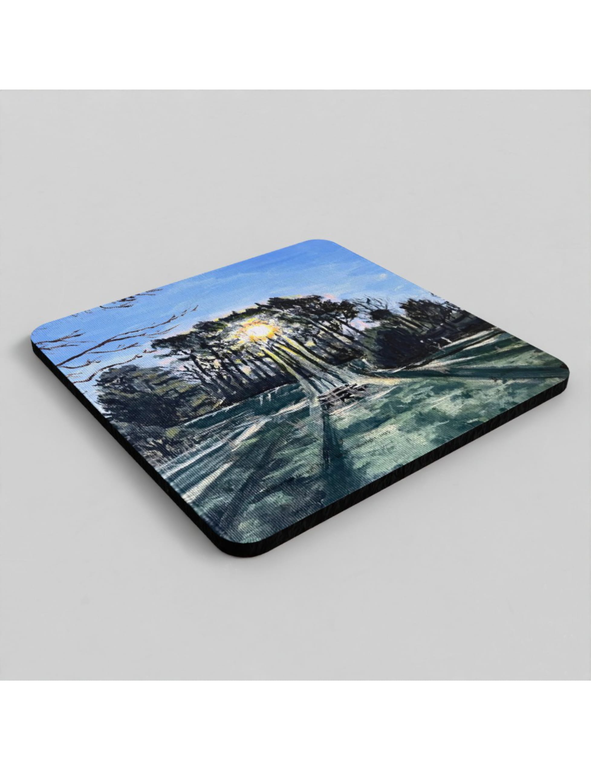 Winter sun Through Trees coasters showing an acrylic painting by Emily Tellwright