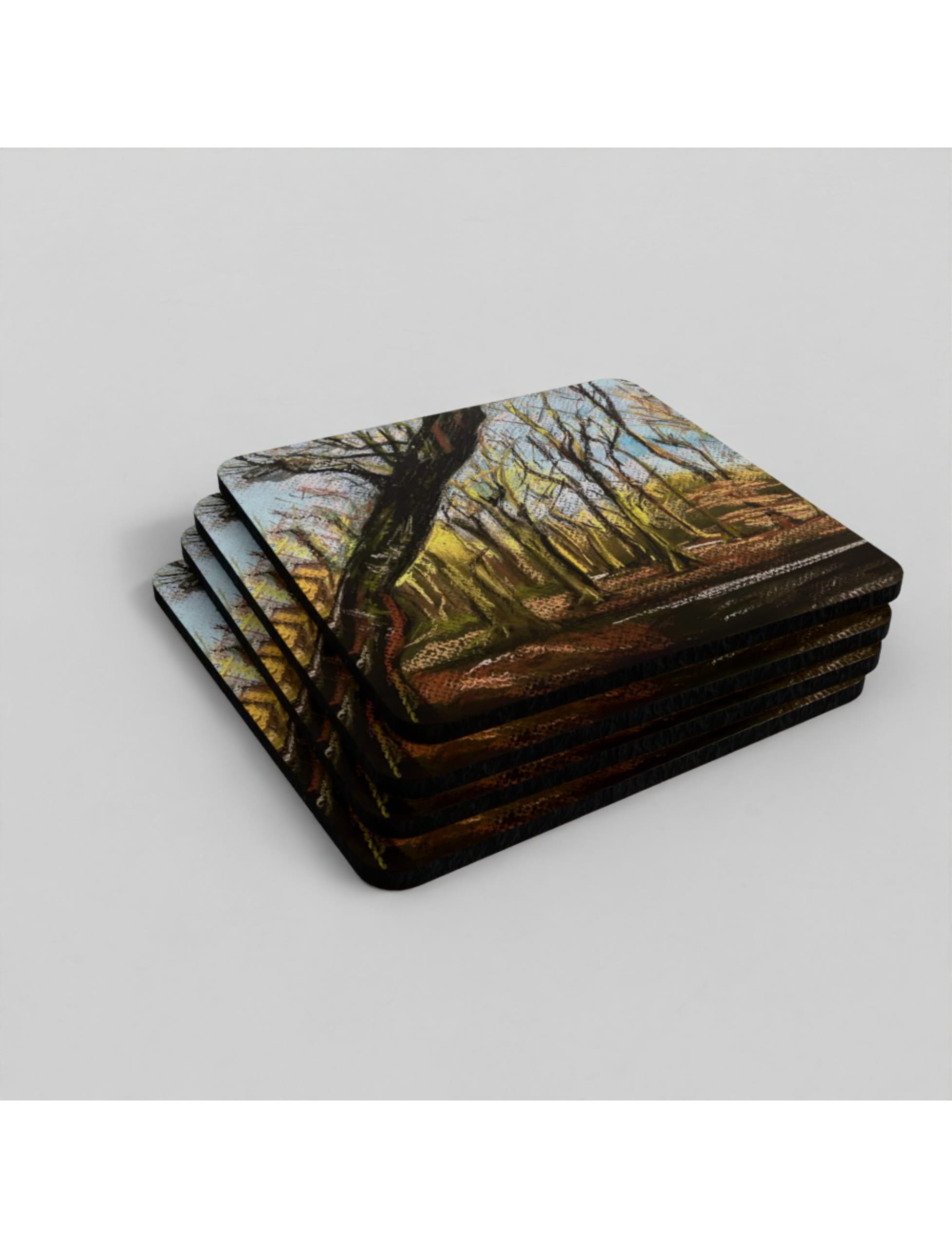 Winter Woodland Coaster showig a pastel drawing by Emily Tellwright