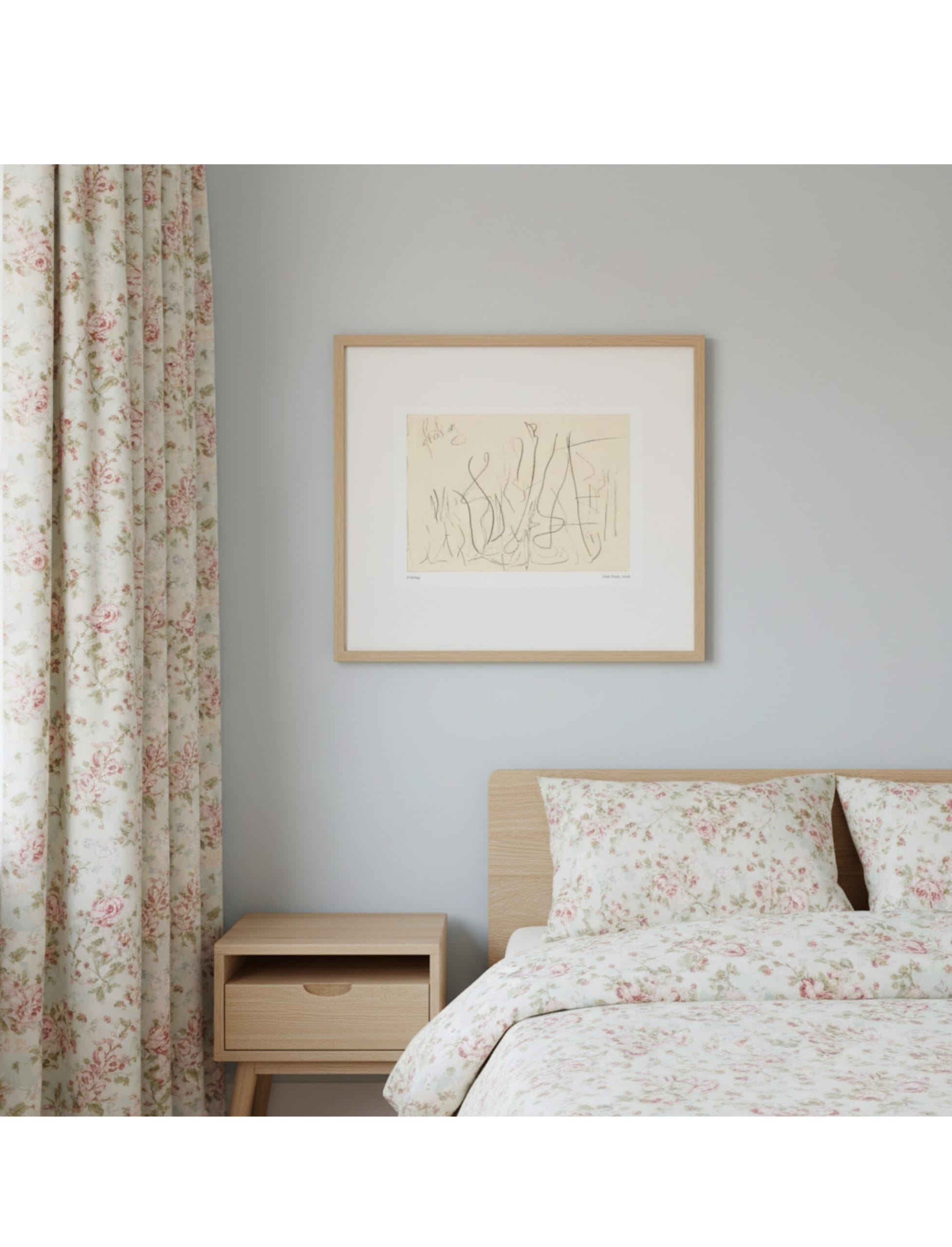 Fruhling Framed art print showing a pencil drawing by John Blake in a white mount and natural wood frame in a bedroom