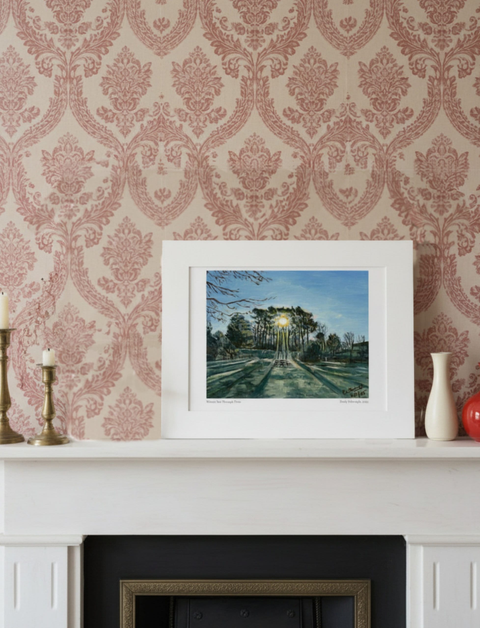 Winter Sun Through Trees Mounted Art Print against patterned wall paper on a mantel piece